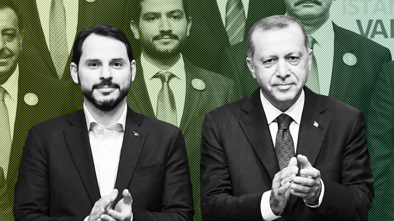 Turkish President Recep Tayyip Erdogan (R) poses with the parliamentary member candidate Turkish Energy Minister Beraat Albayrak (L) on May 29, 2018 in Istanbul during an electoral meeting presenting candidates for the upcoming parliamentary elections. - Turkey holds snap parliamentary and presidential elections on June 24. (Photo by OZAN KOSE / AFP)        (Photo credit should read OZAN KOSE/AFP/Getty Images)