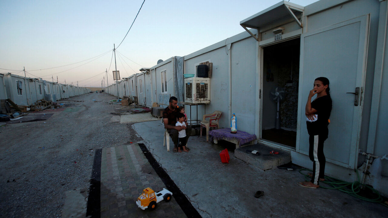 Displaced Christian family is seen at Ankawa refugee camp in Erbil, Iraq September 12, 2018. Picture taken September 12, 2018. REUTERS/Azad Lashkari - RC1C0E580050