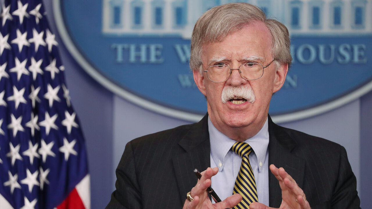 U.S. National Security Advisor John Bolton answers questions from reporters after announcing that the U.S. will withdraw from the Vienna protocol and the 1955 "Treaty of Amity" with Iran as White House Press Secretary Sarah Huckabee Sanders looks on during a news conference in the White House briefing room in Washington, U.S., October 3, 2018.      REUTERS/Jonathan Ernst - RC17A0C7F6B0