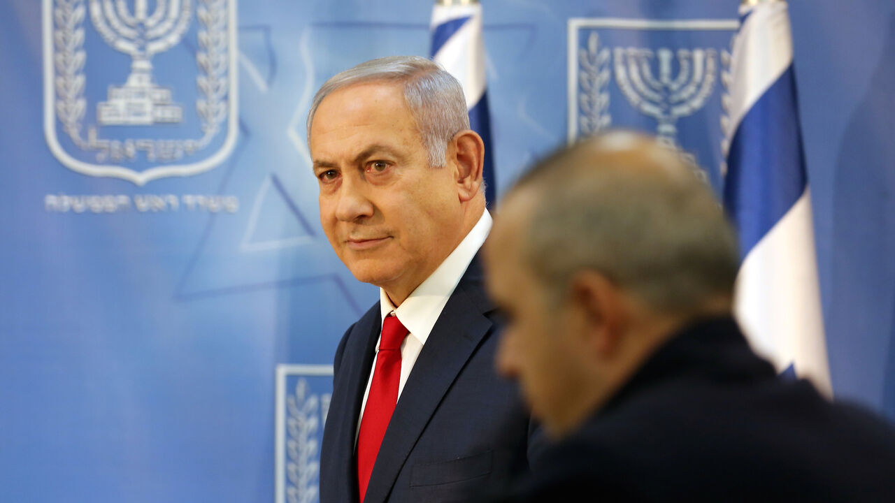 Israel's Prime Minister Benjamin Netanyahu arrives to deliver a statement to the members of the media in Tel Aviv, Israel November 18, 2018. REUTERS/Corinna Kern - RC19E681F200