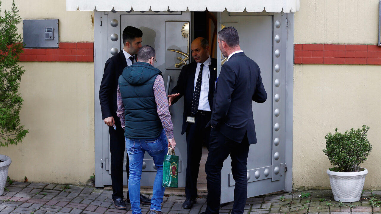 A man enters to Saudi Arabia's consulate as security officers stand at the entrance in Istanbul, Turkey October 31, 2018. REUTERS/Osman Orsal - RC1D19130020