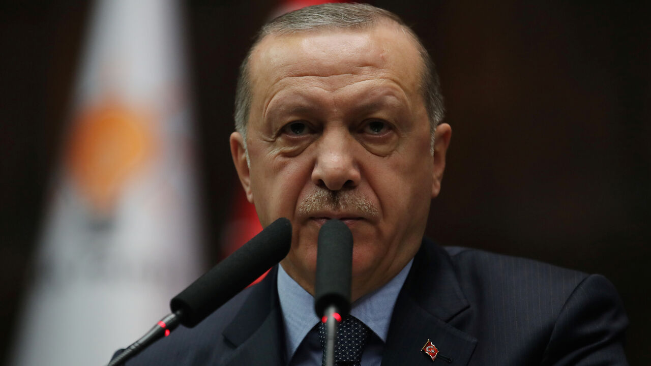 Turkish President Tayyip Erdogan addresses members of parliament from his ruling AK Party (AKP) during a meeting at the Turkish parliament in Ankara, Turkey, January 8, 2019. REUTERS/Umit Bektas - RC11DD776AB0