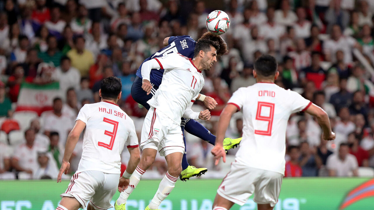 Soccer Football - AFC Asian Cup - Semi-Final - Iran v Japan - Hazza Bin Zayed Stadium, Al Ain, United Arab Emirates - January 28, 2019   Iran's Vahid Amiri in action with Japan's Hiroki Sakai      REUTERS/Suhaib Salem - RC18FD209230