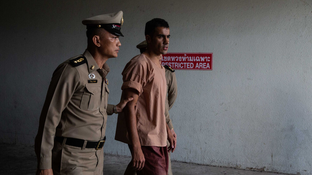BANGKOK, THAILAND - FEBRUARY 04:  The departure of Hakeem al-Araibi, a refugee footballer, from Bangkok's Criminal Court on February 4, 2019 in Bangkok, Thailand. The Thai court is hearing the request to extradite the Bahraini football player, who was detained in Bangkok during his honeymoon. (Photo by Lauren DeCicca/Getty Images)