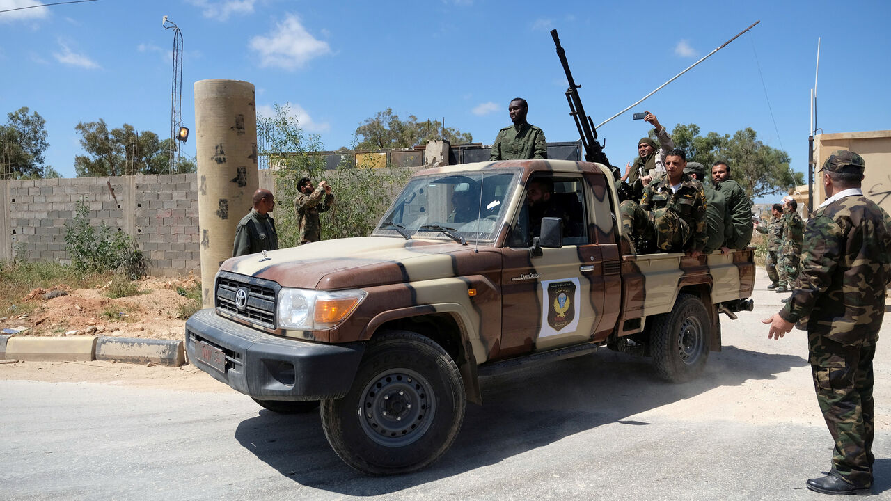 Libyan National Army (LNA) members, commanded by Khalifa Haftar, head out of Benghazi to reinforce the troops advancing to Tripoli, in Benghazi, Libya April 7, 2019. REUTERS/Esam Omran Al-Fetori - RC1A261C5320