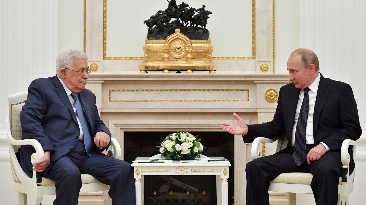 Russian President Vladimir Putin (R) meets with Palestinian President Mahmoud Abbas at the Kremlin in Moscow, Russia July 14, 2018. Pool/Yuri Kadobnov via REUTERS - RC140E5CC0F0