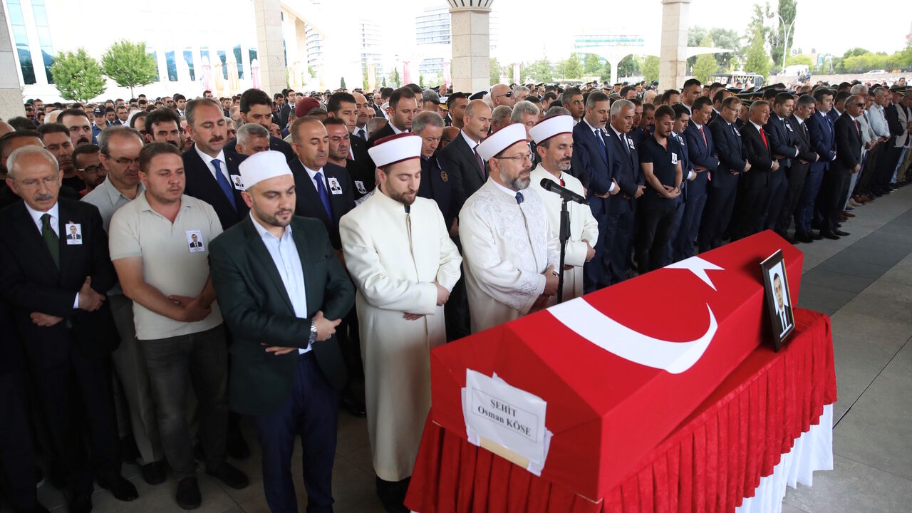 ANKARA, TURKEY - JULY 18: Chairman of the Republican People's Party (CHP) Kemal Kilicdaroglu, Turkish Interior Minister Suleyman Soylu, Turkish Foreign Minister Mevlut Cavusoglu, Turkish Justice Minister Abdulhamit Gul, Head of the National Intelligence Organization (MIT) of Turkey Hakan Fidan and Grand Unity Party (BBP) Chairman Mustafa Destici attend the funeral of Turkish diplomat Osman Kose, who was martyred in an armed attack in Iraq's Erbil, at Ahmet Hamdi Akseki Mosque in Ankara, Turkey on July 18, 2