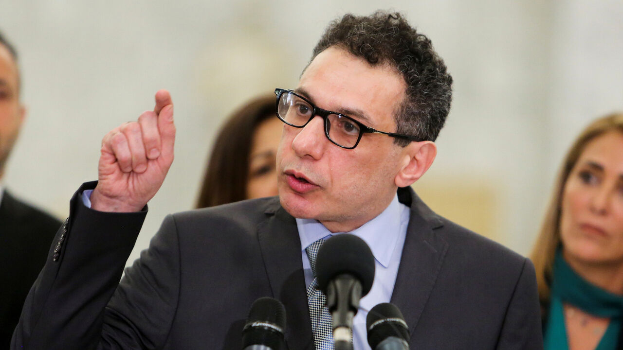 Freed Lebanese businessman Nizar Zakka, who had been detained in Iran since 2015, gestures during a news conference at the Presidential Palace in Baabda, Lebanon June 11, 2019. REUTERS/Aziz Taher - RC161D667D00