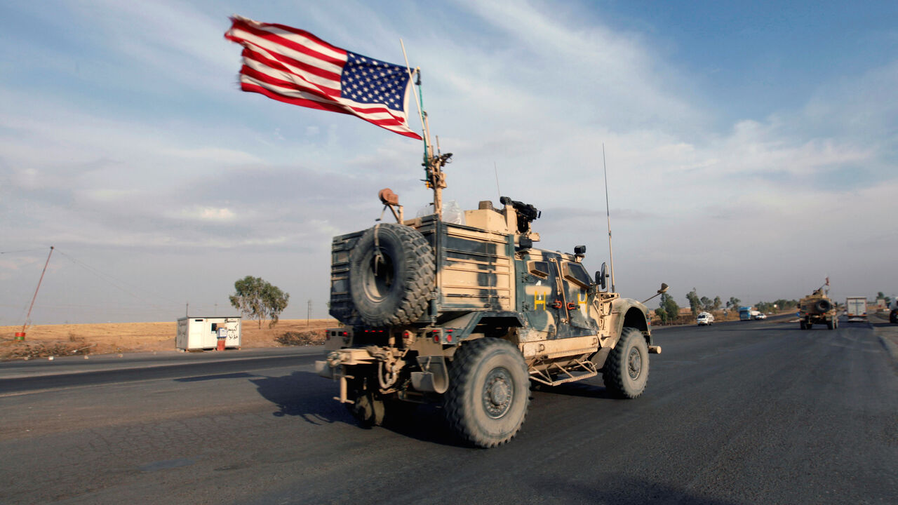 A convoy of U.S. vehicles is seen after withdrawing from northern Syria, in Erbil, Iraq October 21, 2019. REUTERS/Azad Lashkari - RC1AB61E8440