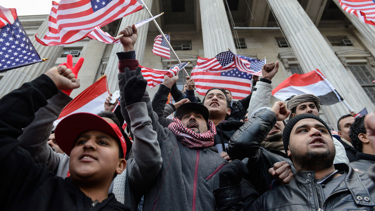 People participate in a Yemeni protest against President Donald Trump's travel ban in the Brooklyn borough of New York City, U.S. February 2, 2017. REUTERS/Stephanie Keith - RC134E1B67C0