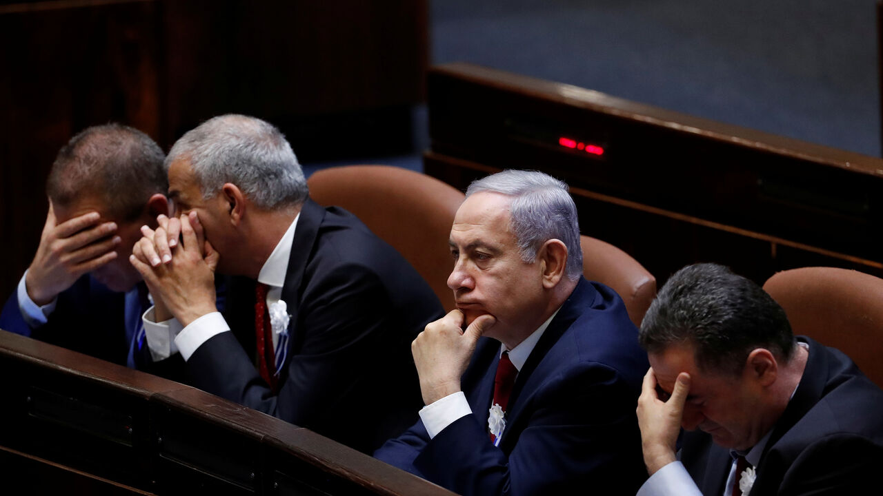 Israeli Prime Minister Benjamin Netanyahu attends the swearing-in ceremony of the 22nd Knesset, the Israeli parliament, in Jerusalem October 3, 2019. REUTERS/Ronen Zvulun - RC13F4927B00