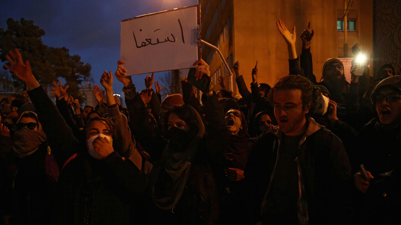 Iranian people gather to show their sympathy to the victims of the crash of the Boeing 737-800 plane, flight PS 752, in Tehran, Iran January 11, 2020. Nazanin Tabatabaee/WANA (West Asia News Agency) via REUTERS ATTENTION EDITORS - THIS IMAGE HAS BEEN SUPPLIED BY A THIRD PARTY - RC2TDE9E5L0J