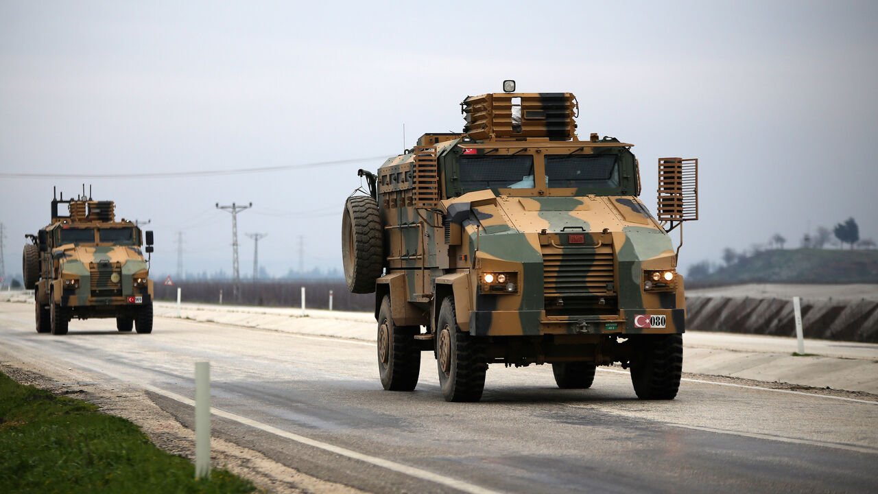 HATAY, TURKEY - FEBRUARY 12: A convoy of Turkish Armed Forces, including Armoured Personnel Carrier (APC) vehicles carrying commandos, pass through Hatay province of Turkey to support the border units on February 12, 2020. (Photo by Eren Bozkurt/Anadolu Agency via Getty Images)