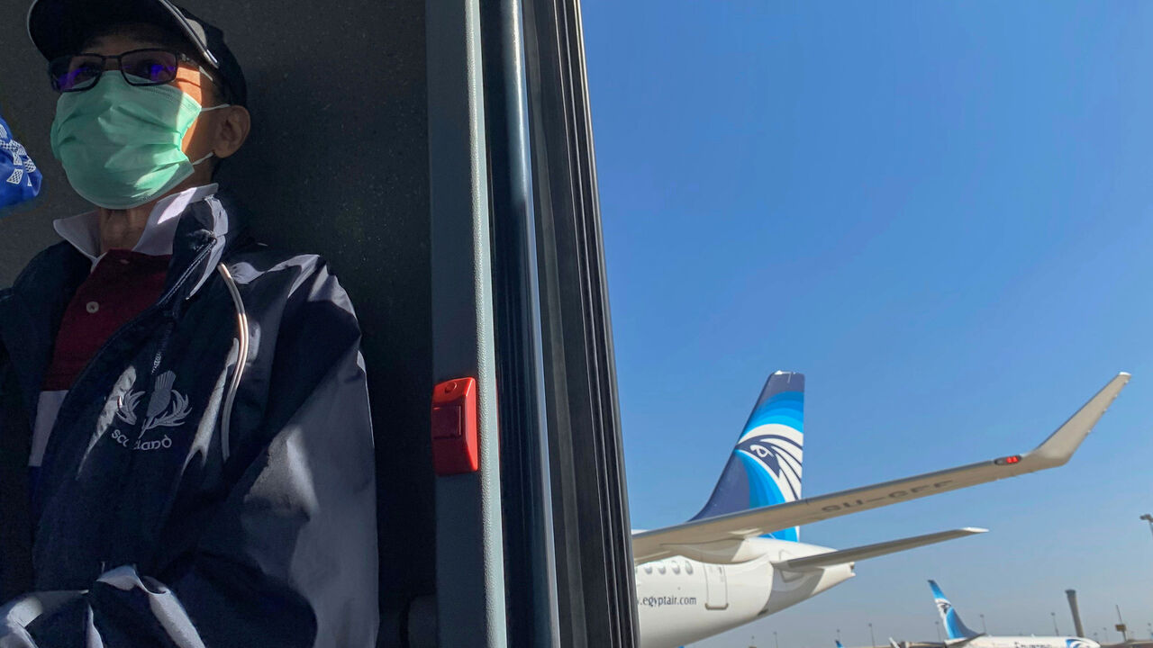 A passenger wears a protective mask at Cairo International Airport, following the outbreak of the coronavirus disease (COVID-19), in Cairo, Egypt March 10, 2020. REUTERS/Mohamed Abd El Ghany - RC2ZGF9LL3SF