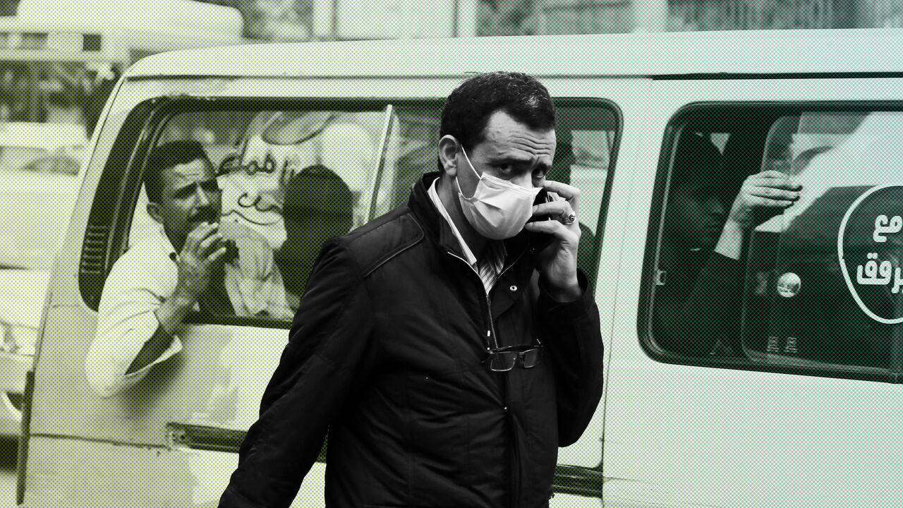 CAIRO, EGYPT - APRIL 12: A pedestrian wearing a mask walks on a street in Cairo, Egypt, on April 12, 2020. Egypt's Health Ministry confirmed on Sunday 126 new cases and 13 new deaths of COVID-19, raising the total number of cases registered in the country to 2,065, including 159 deaths. (Photo by Ahmed Gomaa/Xinhua via Getty) (Xinhua/ via Getty Images)