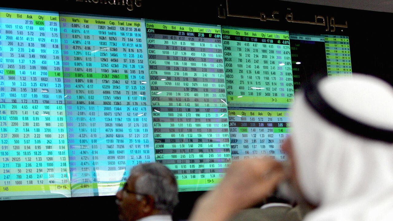 Jordanian traders follow the market's movements at the Amman Stock Exchange on October 21, 2008. Jordan's King Abdullah II announced earlier this month a series of economic measures for his cash-strapped desert kingdom, where inflation and unemployment are both hovering around 15 percent. AFP PHOTO/KHALIL MAZRAAWI (Photo credit should read KHALIL MAZRAAWI/AFP via Getty Images)