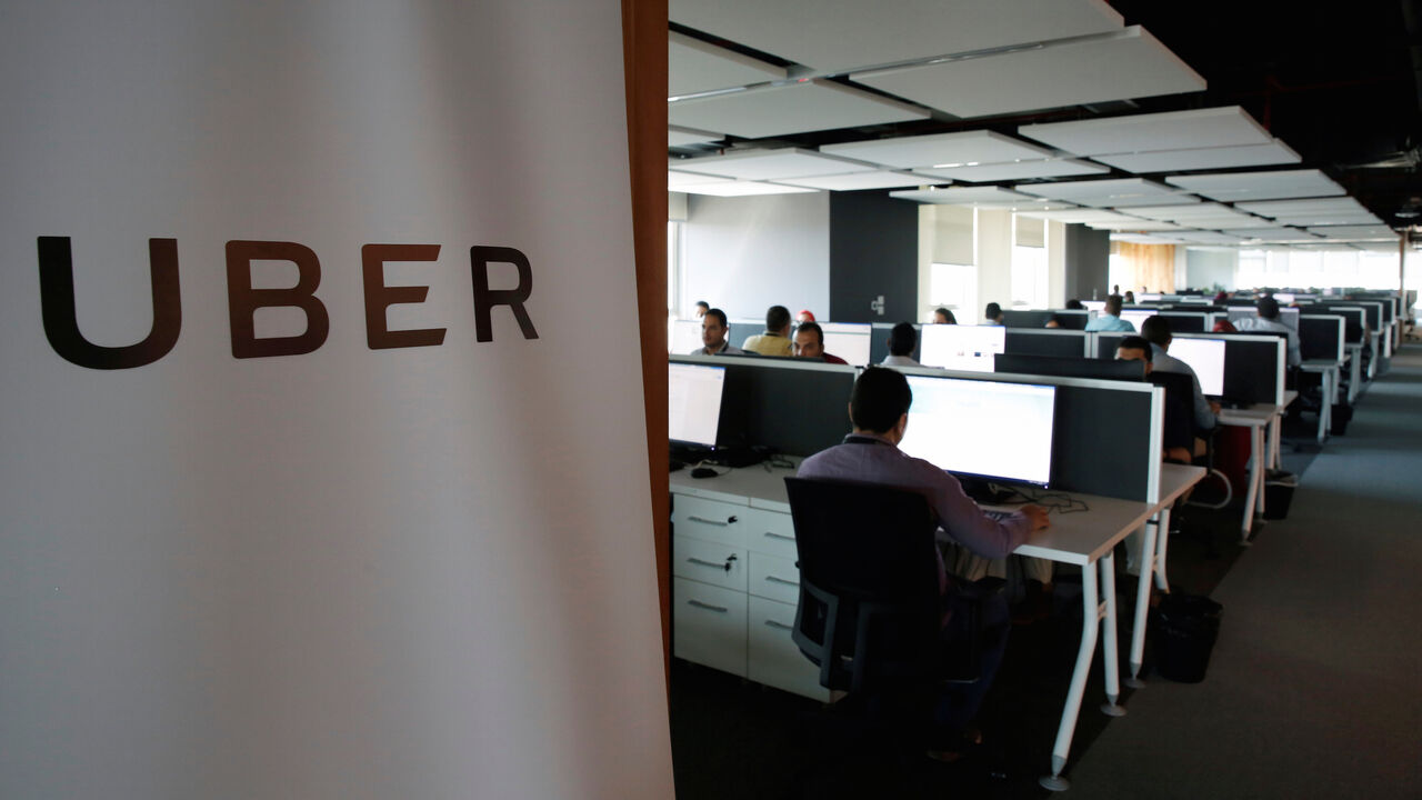 Employees work inside Uber's Centre of Excellence (COE) office in Cairo, Egypt October 10, 2017. REUTERS/Amr Abdallah Dalsh - RC14851C04A0