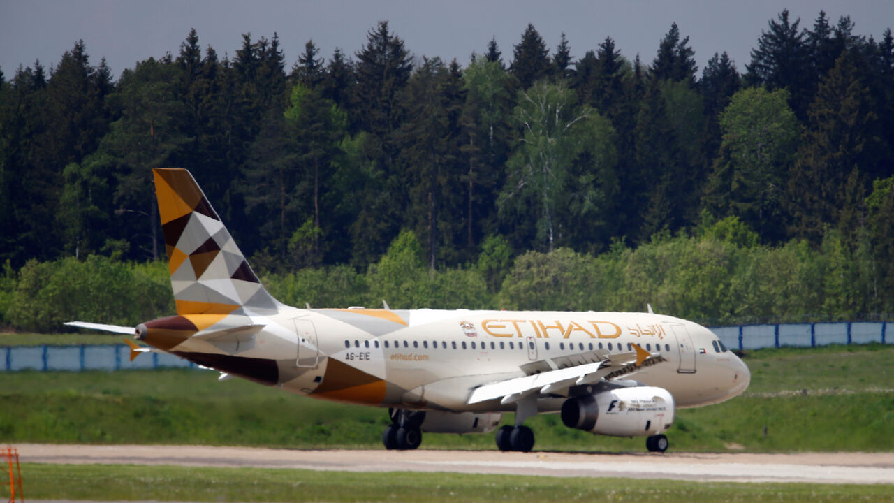 A plane of Etihad Airways company is seen at Minsk international airport near the village of Slabada, Belarus, May 19, 2016.  REUTERS/Vasily Fedosenko - D1AETKFQNAAC