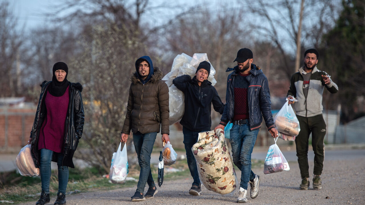 EDIRNE, TURKEY - MARCH 08: Refugees and migrants walk on a road towards the Pazarkule Border Crossing between Turkey and  Greece on March 08, 2020 in Edirne, Turkey.  Thousands of refugees and migrants have flocked to the Greece, Turkey border after Turkey announced that it would open border gates for a period of 72hrs to allow refugees to cross into European countries after thirty three Turkish soldiers were killed in a Syrian air raid in Idlib. (Photo by Burak Kara/Getty Images)