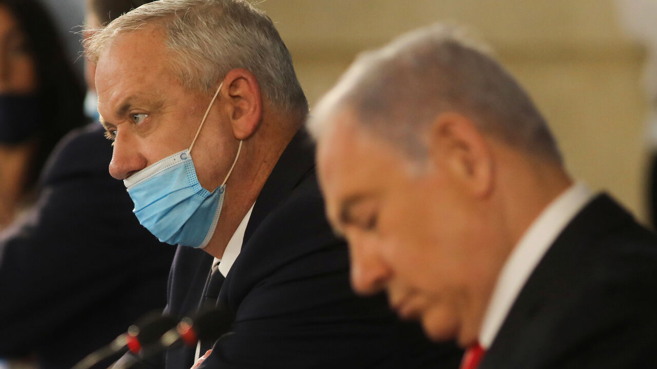 Israeli Prime Minister Benjamin Netanyahu and Alternate Prime Minister and Defence Minister Benny Gantz attend the weekly cabinet meeting in Jerusalem June 7, 2020. Menahem Kahana/Pool via REUTERS - RC294H9BAXQW