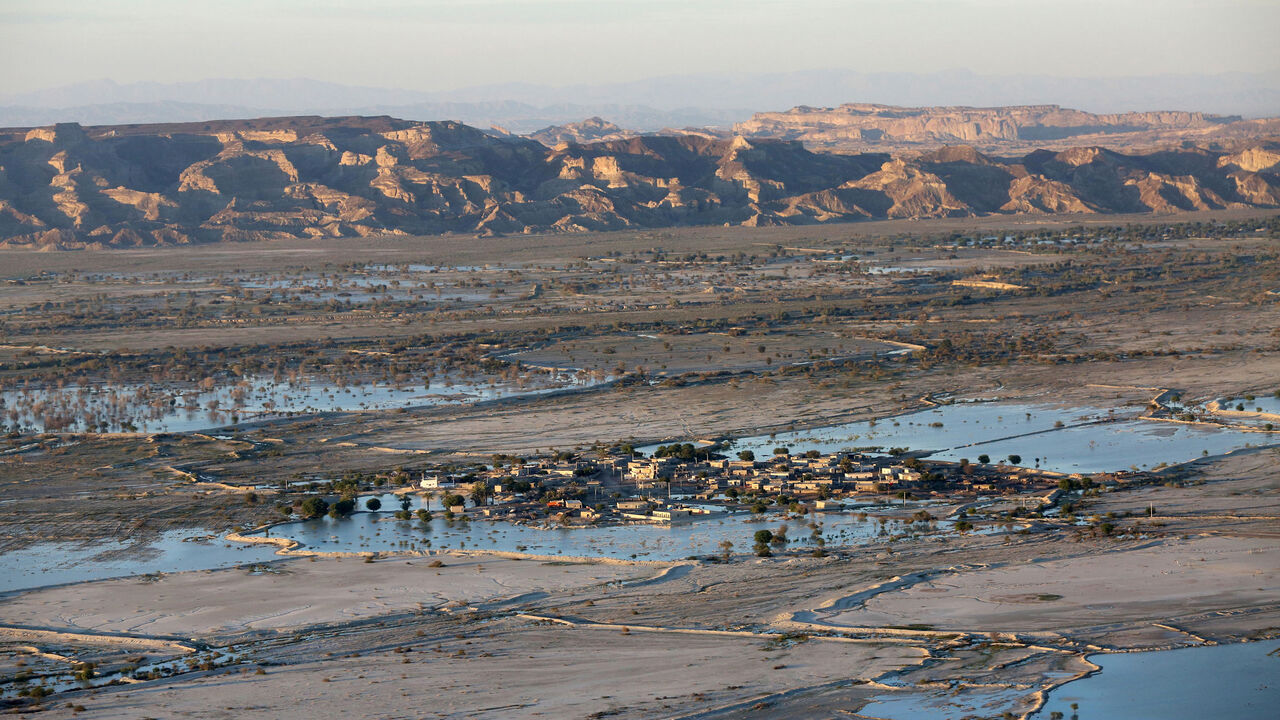 A picture taken on January 13, 2020 shows flooding in Iran's Sistan-Baluchistan region with rain water covering the village Dashtiari, as severe downpour led to floods across region, blocking roads and damaging homes. (Photo by ALIREZA MASOUMI / ISNA / AFP) (Photo by ALIREZA MASOUMI/ISNA/AFP via Getty Images)