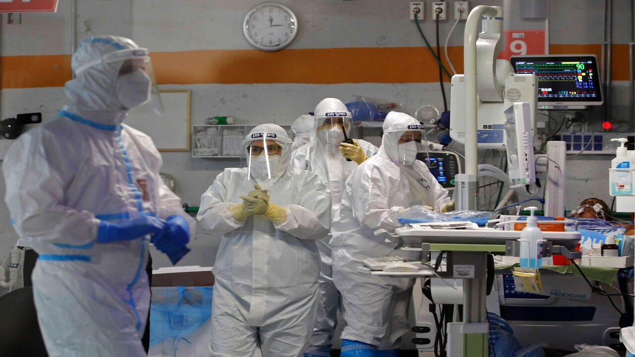 Medical staff work in the COVID-19 isolation ward of Sheba Medical Center, Israel's largest hospital, in Ramat Gan near the coastal city of Tel Aviv on June 30, 2020. (Photo by GIL COHEN-MAGEN / AFP) (Photo by GIL COHEN-MAGEN/AFP via Getty Images)