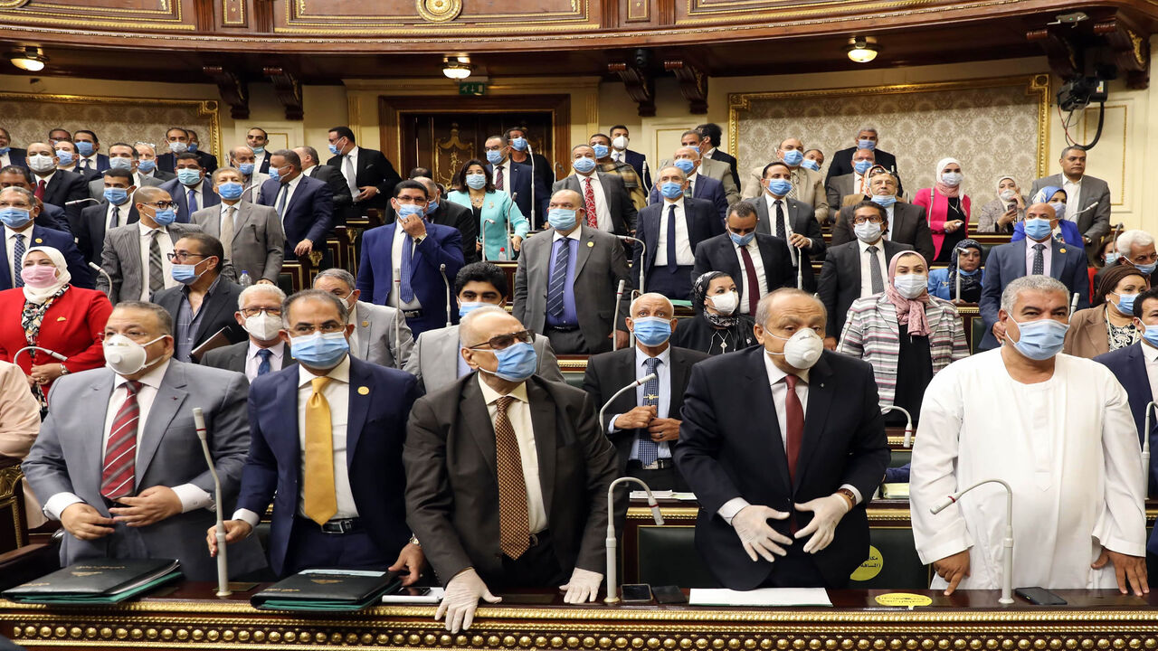 Egyptian parliament members attend a general session in the capital Cairo on July 20, 2020. - Egypt's parliament greenlighted behind a closed-doors session later today, the possible deployment of troops in Libya to support Cairo's ally Khalifa Haftar, if rival Turkish-backed forces recapture the city of Sirte, the house said. (Photo by - / AFP) (Photo by -/AFP via Getty Images)
