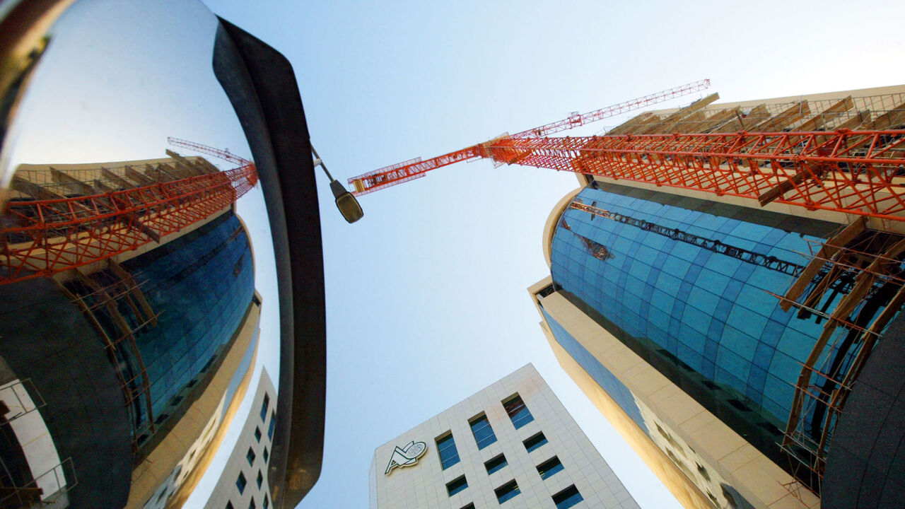 MANAMA, BAHRAIN - NOVEMBER 25:  Buildings are under construction to accommodate the influx of business as the banking industry continues to grow November 25,2002 in Manama, Bahrain. The country is the home port for the United States Navy's 5th Fleet, the battle group that patrols the Gulf. The kingdom is a crucial link in any war with Iraq. The Navy has had a base there since 1948. (Photo by Joe Raedle/Getty Images)