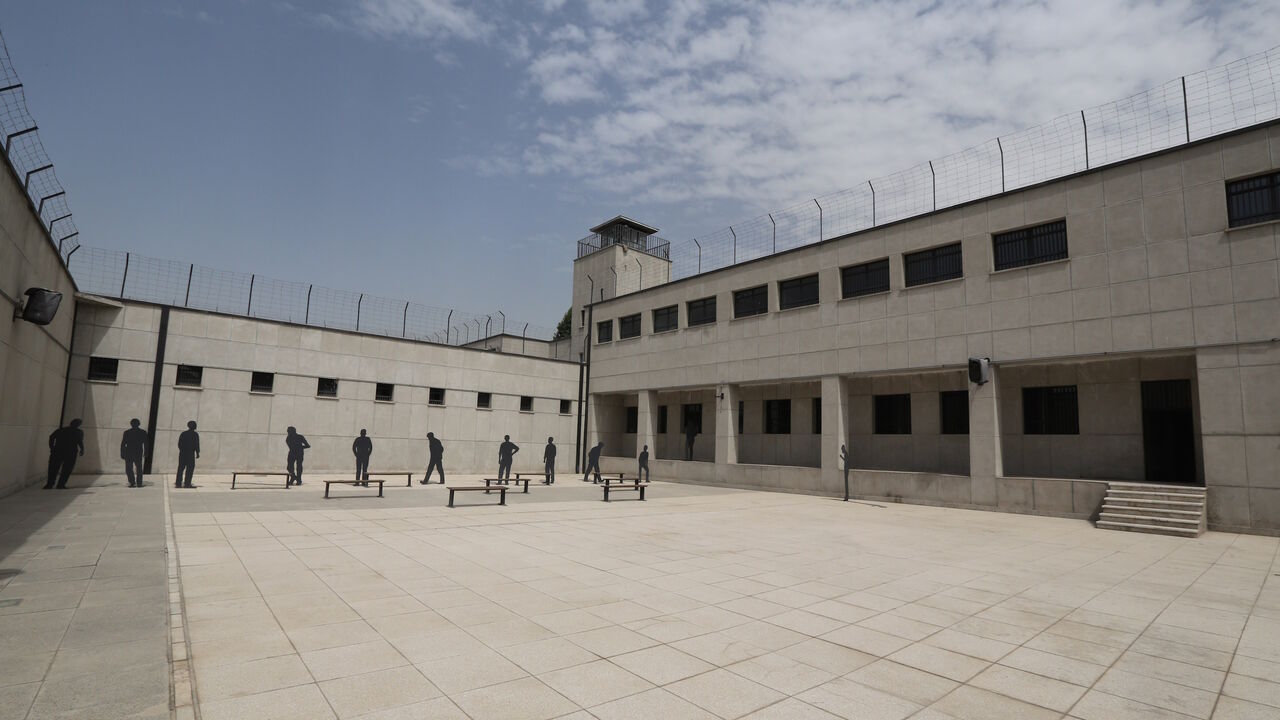 A picture taken on September 2, 2014 in the Iranian capital Tehran shows bronze statues displayed in the courtyard of the "Qasr prison", a former prison hosting political prisoners that was turned into a museum in 2012. The building was built in 1790 at the time of Qajar king, Fath-ali Shah by the Russian architect Markov before it was converted into a prison in 1929.    AFP PHOTO/ATTA KENARE        (Photo credit should read ATTA KENARE/AFP via Getty Images)