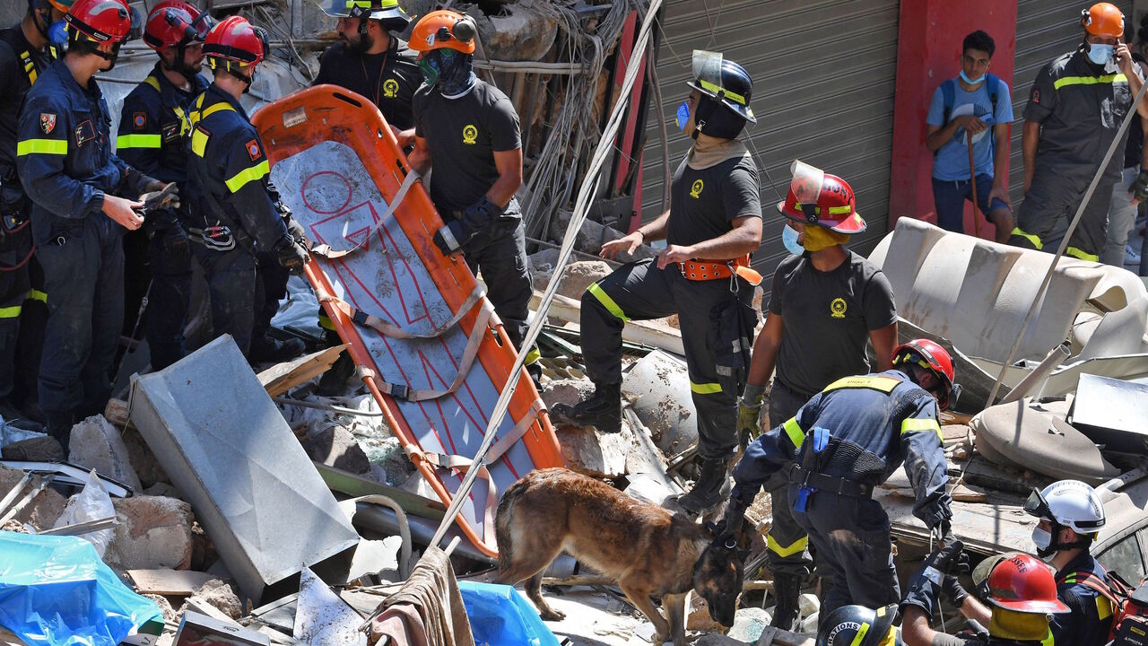 Lebanese and French rescuers search for victims or survivors amidst the rubble of a building in the Gemayzeh neighbourhood on August 6, 2020, two days after a massive explosion in the Beirut port shook the capital. - The blast caused massive destruction and killed at least 113 people, heaping misery on a country in crisis. (Photo by - / AFP) (Photo by -/AFP via Getty Images)
