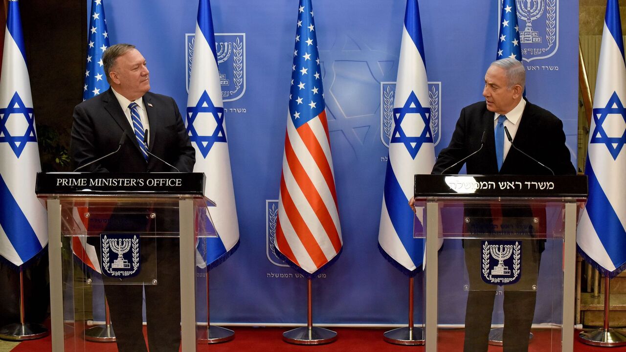 US Secretary of State Mike Pompeo (L) and Israeli Prime Minister Benjamin Netanyahu make a joint statement to the press after meeting in Jerusalem, on August 24, 2020. - Pompeo arrived in Israel kicking off a five-day visit to the Middle East which will take him to Sudan, the United Arab Emirates, and Bahrain, focusing on Israel's normalising of ties with the UAE and pushing other Arab states to follow suit. (Photo by DEBBIE HILL / various sources / AFP) (Photo by DEBBIE HILL/AFP via Getty Images)