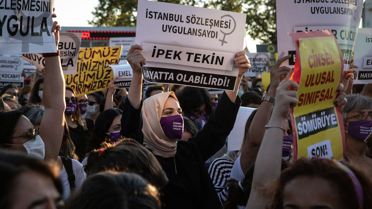 ISTANBUL, TURKEY - AUGUST 05: Women chant slogans and wave signs during a demonstration for the prevention of violence against women on  August 05, 2020 in Istanbul, Turkey. Women's rights groups staged simultaneous protests in various Turkish cities in support of the Istanbul Convention on domestic violence against women. The Istanbul Convention is an international agreement  for the prevention of violence against women. Forty six countries signed the agreement started by the European Council in 2011. Turk