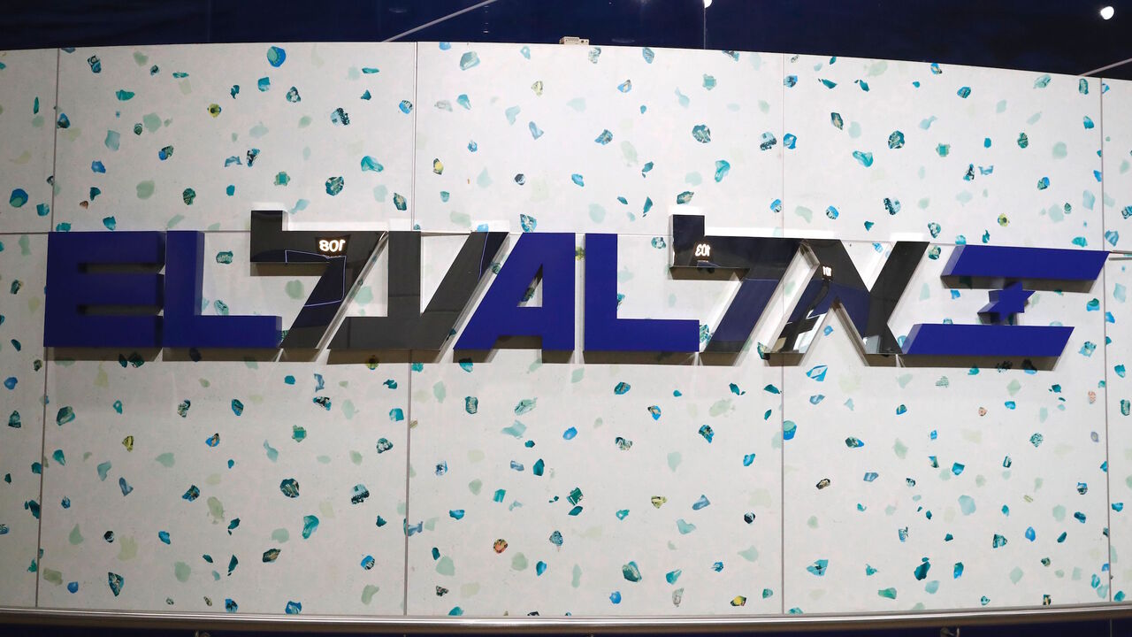 This picture taken on July 7, 2020 shows a view of the sign showing the logo of Israeli El Al airline, at the check-in counter at Israel's Ben Gurion Airport in Lod, east of Tel Aviv. - Israeli airline El Al said on July 6 it had agreed to a government bailout that could pave the way for the carrier's renationalisation, after losses linked to the novel coronavirus pandemic. The plan also reportedly involves a stock offering, with the government agreeing to absorb any stock left unsold from that offering. (P