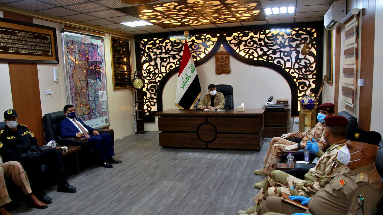 Iraqi Prime Minister Mustafa al-Kadhemi (C) chairs a meeting with military commanders in Tarmiyah, 35 kilometres (20 miles) north of Baghdad on July 20, 2020. (Photo by Khalid MOHAMMED / POOL / AFP) (Photo by KHALID MOHAMMED/POOL/AFP via Getty Images)