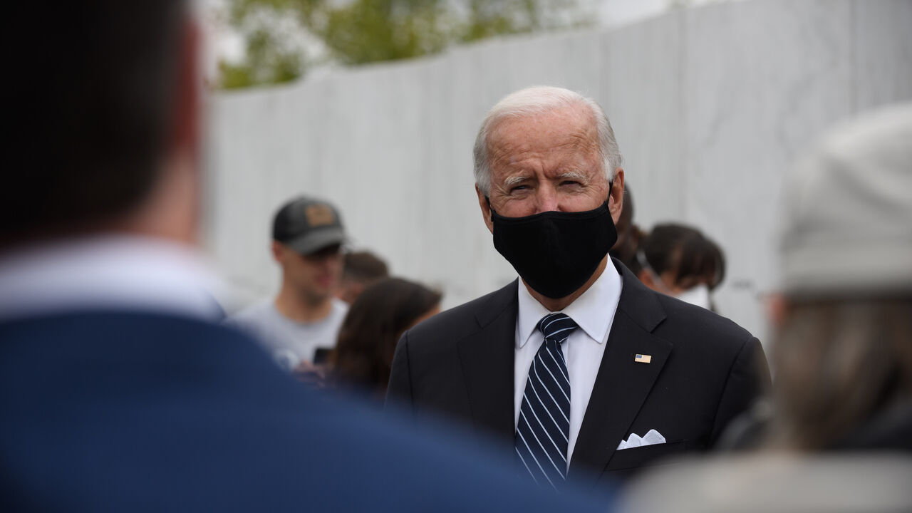SHANKSVILLE, PA - SEPTEMBER 11: Democratic presidential nominee and former Vice President Joe Bidenand his wife, Jill, greet family members of victims after laying a wreath in front of her brother, Leroy Homers name at the Wall of Names following a ceremony at the Flight 93 National Memorial commemorating the 19th Anniversary of the crash of Flight 93 and the September 11th terrorist attacks on September 11, 2020 in Shanksville, Pennsylvania. The nation is marking the nineteenth anniversary of the terror at