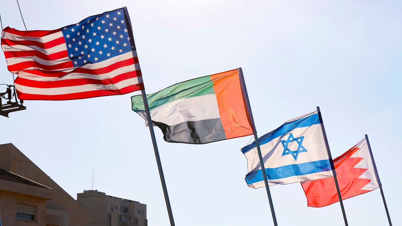 A road is decorated with the flags of (L-R) the US, the United Arab Emirates, Israel and Bahrain, in the resort city of Netanya in central Israel, on September 13, 2020. - The UAE and Bahrain will sign agreements to recognise Israel, on September 15.
US President Donald Trump and Israeli Prime Minister Benjamin Netanyahu are to sign the Abraham accords -- a reference to the common traditions of Islam, Judaism and Christianity -- at a White House ceremony. (Photo by JACK GUEZ / AFP) (Photo by JACK GUEZ/AFP v