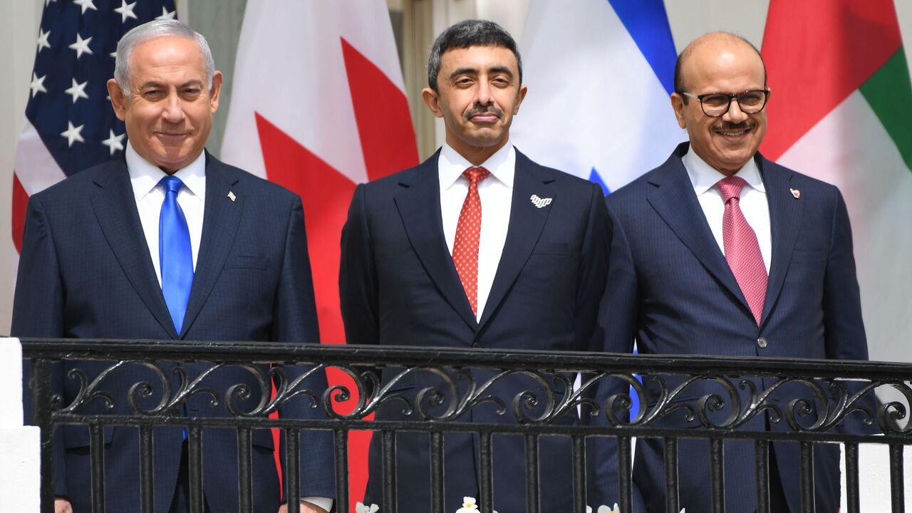 (L-R)Israeli Prime Minister Benjamin Netanyahu,UAE Foreign Minister Abdullah bin Zayed Al-Nahyan and Bahrain Foreign Minister Abdullatif al-Zayani pose before they participate in the signing of the Abraham Accords where the countries of Bahrain and the United Arab Emirates recognize Israel, on the South Lawn of the White House in Washington, DC, September 15, 2020. - Israeli Prime Minister Benjamin Netanyahu and the foreign ministers of Bahrain and the United Arab Emirates arrived September 15, 2020 at the 