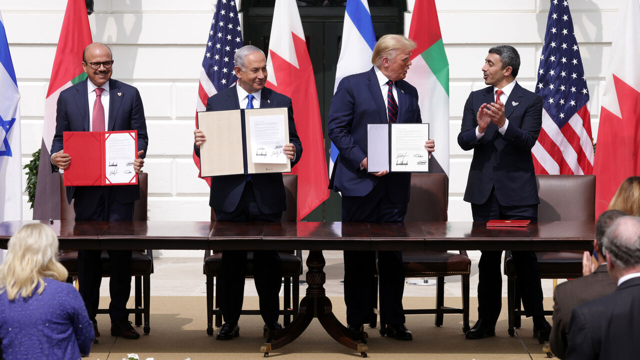 WASHINGTON, DC - SEPTEMBER 15: (L-R) Foreign Affairs Minister of Bahrain Abdullatif bin Rashid Al Zayani, Prime Minister of Israel Benjamin Netanyahu, U.S. President Donald Trump, and Foreign Affairs Minister of the United Arab Emirates Abdullah bin Zayed bin Sultan Al Nahyan participate in the signing ceremony of the Abraham Accords on the South Lawn of the White House on September 15, 2020 in Washington, DC. Witnessed by President Trump, Prime Minister Netanyahu signed a peace deal with the UAE and a decl
