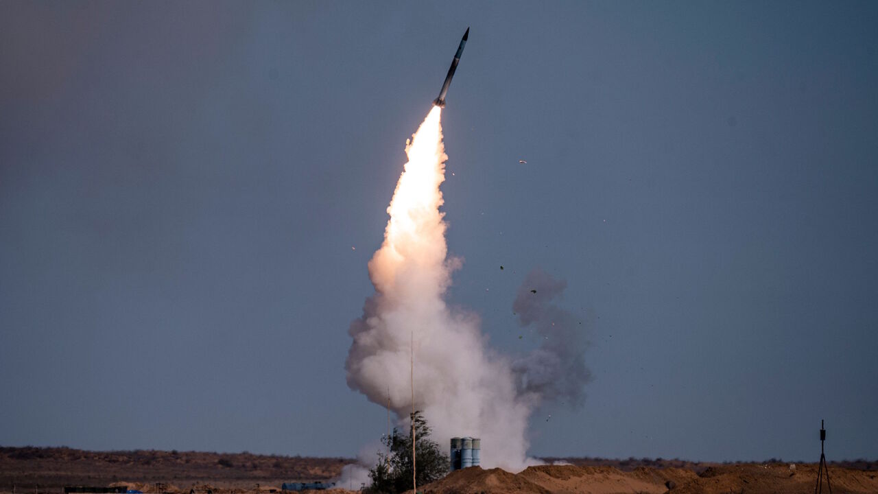 A rocket launches from a S-400 missile system at the Ashuluk military base in Southern Russia on September 22, 2020 during the "Caucasus-2020" military drills gathering China, Iran, Pakistan and Myanmar troops, along with ex-Soviet Armenia, Azerbaijan and Belarus. - Up to 250 tanks and around 450 infantry combat vehicles and armoured personnel carriers will take part in the September 21 to 26 land and naval exercises that will involve 80,000 people including support staff. (Photo by Dimitar DILKOFF / AFP) (