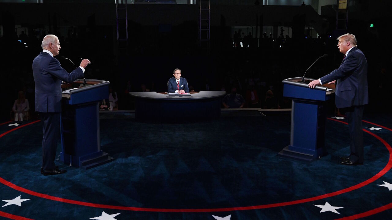 US President Donald Trump (R) and Democratic presidential candidate Joe Biden participate in the first presidential debate at the Health Education Campus of Case Western Reserve University on September 29, 2020 in Cleveland, Ohio. - Biden said on October 2, 2020, he has tested negative for Covid-19, three days after his debate with Trump, who has contracted the illness. Trump's positive diagnosis was announced in the early hours of Friday after one of his senior aides, Hope Hicks, tested positive. (Photo by