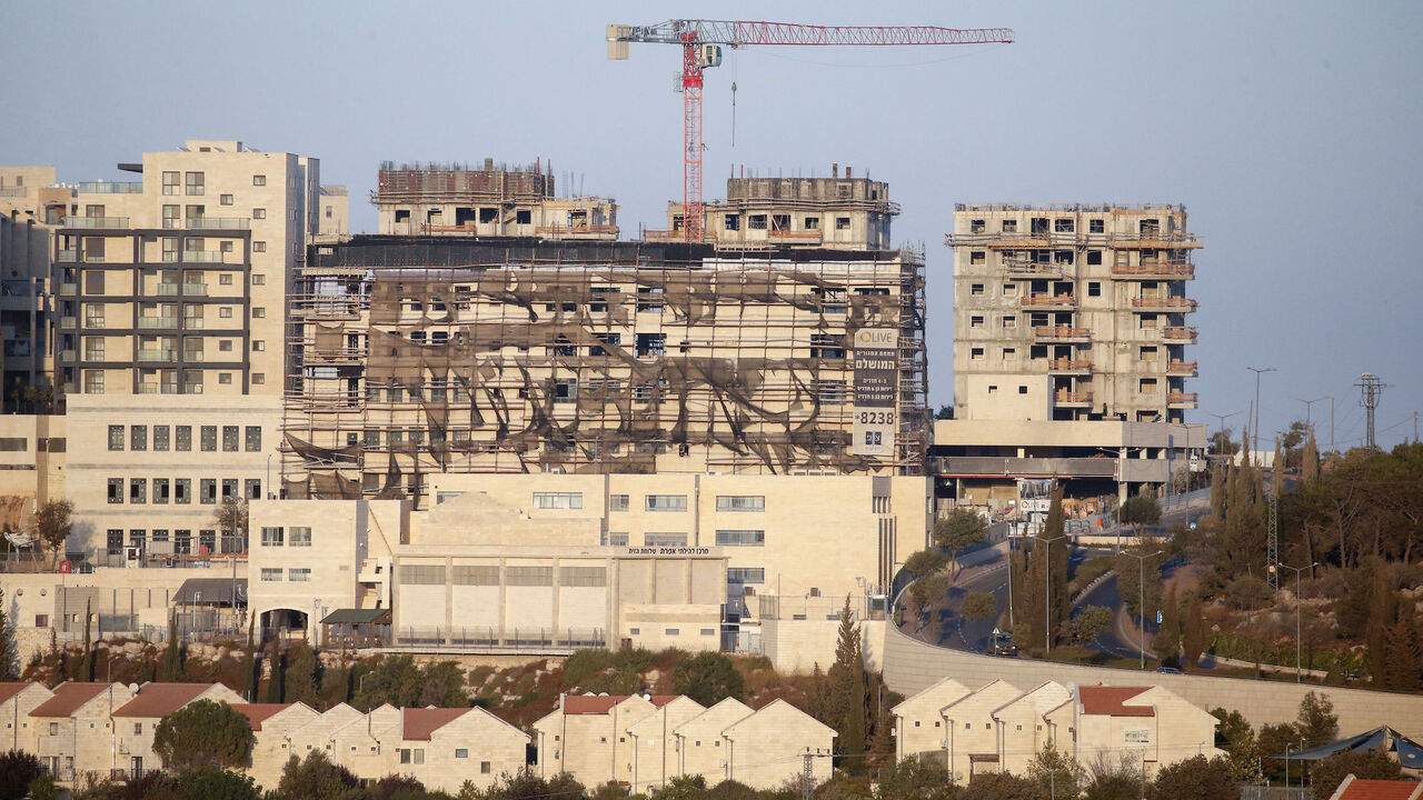 A picture taken on October 14, 2020, shows new buildings in the Israeli settlement of Efrat south of the city of Bethlehem in the occupied West Bank. (Photo by HAZEM BADER / AFP) (Photo by HAZEM BADER/AFP via Getty Images)