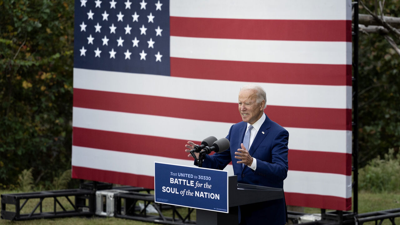 Democratic presidential candidate Joe Biden speaks at The Mountain Top Inn & Resort in Warm Springs, Georgia on October 27, 2020. - Democrat Joe Biden was campaigning in the once reliably Republican state of Georgia on Tuesday and President Donald Trump was hopscotching across the Midwest as the US election campaign entered its final week. Biden, 77, who is leading in the polls ahead of the November 3 vote, was to hold a socially distanced drive-in car rally in Atlanta, Georgia's largest city. (Photo by JIM