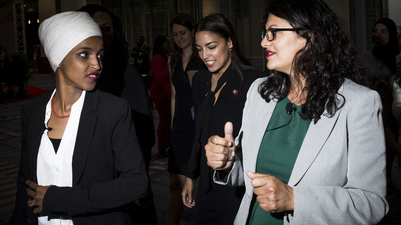 WASHINGTON, DC - SEPTEMBER 11: Rep. Ilhan Omar (D-MN), Rep. Alexandria Ocasio-Cortez (D-NY, and Rep. Rashida Tlaib (D-MI) arrive before participating during a town hall hosted by the NAACP on September 11, 2019 in Washington, DC. Also pictured is CNN Commentator Angela Rye.  (Photo by Zach Gibson/Getty Images)