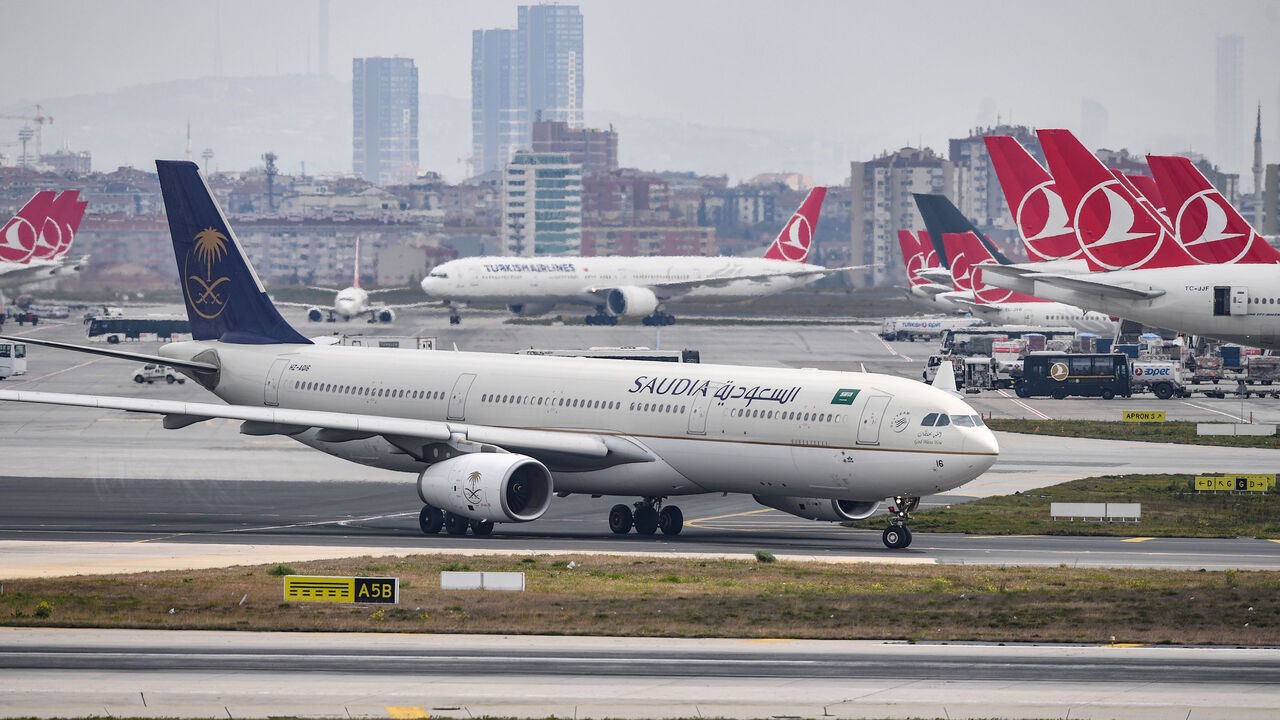 A Saudi Arabian Airlines Saudia plane is pictured on the tarmac of the Ataturk Airport on April 4, 2019, in Istanbul. - A transfer of Istanbul's Ataturk airport operations to its new international facility will begin at April 6 early morning. (Photo by OZAN KOSE / AFP)        (Photo credit should read OZAN KOSE/AFP via Getty Images)