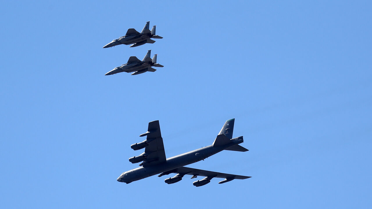 NEW ORLEANS, LOUISIANA - MAY 01: Two B-52 Bombers and two F-15 fighter jets fly over the University Medical Center on May 01, 2020 in New Orleans, Louisiana.  The flyover was done as a salute to first responders and hospital workers in some of the hardest hit areas of the coronavirus (COVID-19). (Photo by Chris Graythen/Getty Images)
