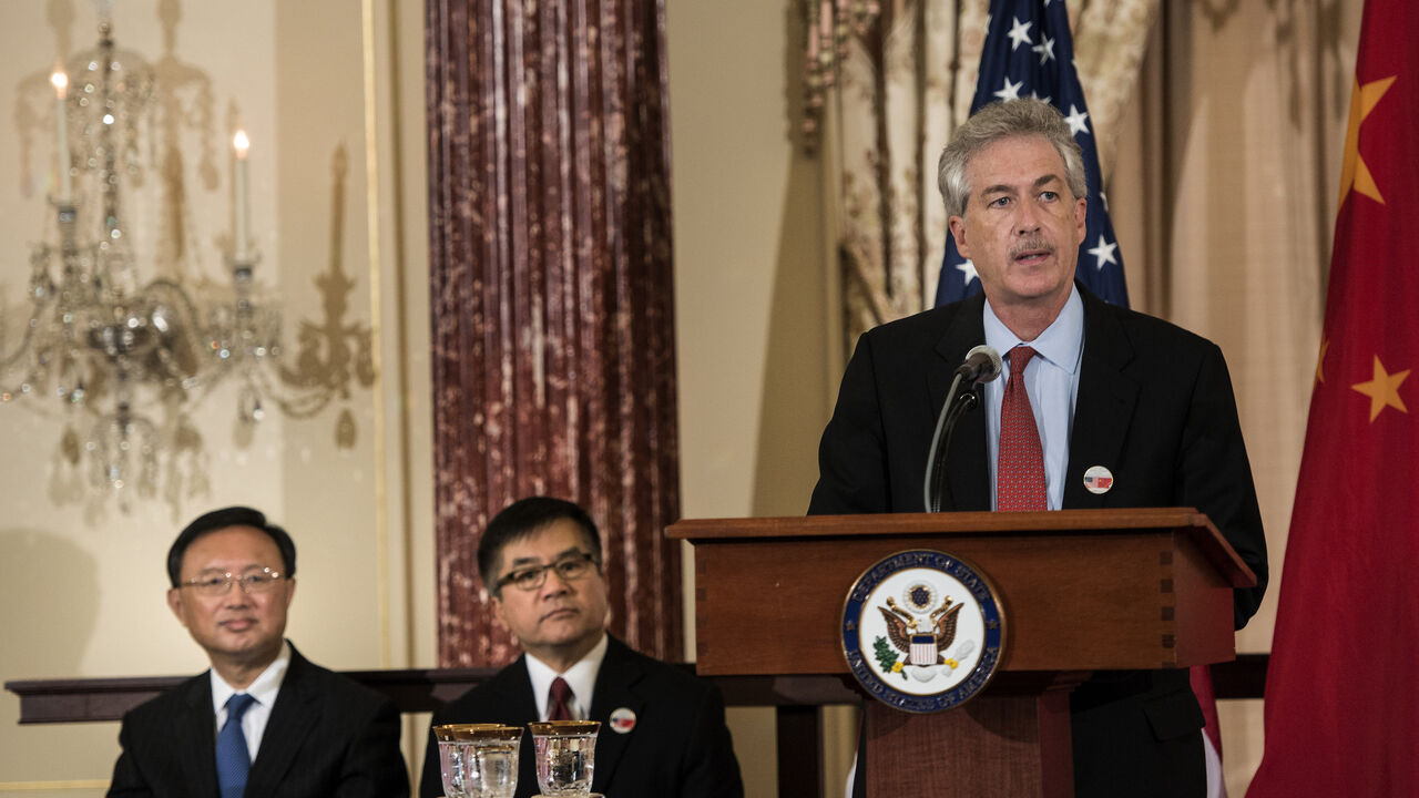 Chinese State Councilor Yang Jiechi (L) and US Ambassador to China Gary Locke (C) listen while US Deputy Secretary of State William Burns speaks during an eco-partnership Event at the US Department of State July 11, 2013 in Washington, DC. Officials from the United States and China are meeting to discus the two world powers' relationships. AFP PHOTO/Brendan SMIALOWSKI        (Photo credit should read BRENDAN SMIALOWSKI/AFP via Getty Images)