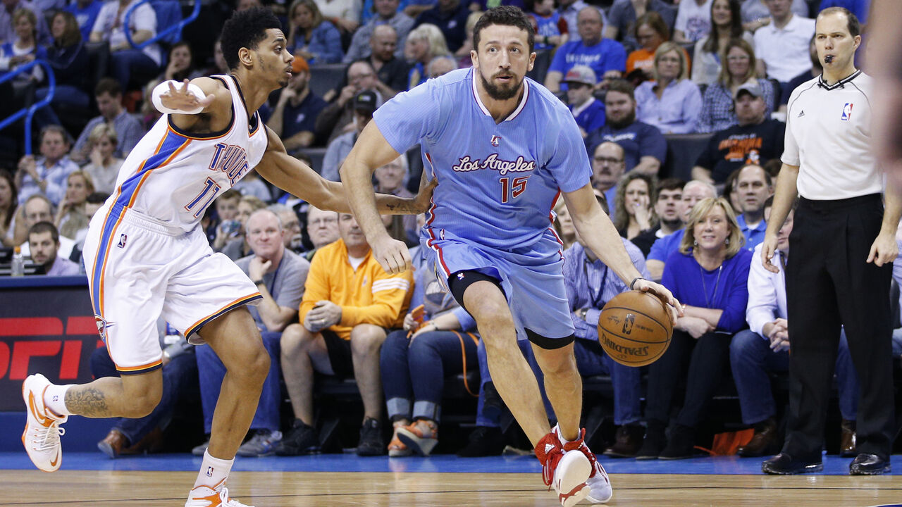 OKLAHOMA CITY, OK - FEBRUARY 8: Hedo Turkoglu #15 of the Los Angeles Clippers handles the ball against Jeremy Lamb #11 of the Oklahoma City Thunder during the game at Chesapeake Energy Arena on February 8, 2015 in Oklahoma City, Oklahoma. The Thunder defeated the Clippers 131-108. NOTE TO USER: User expressly acknowledges and agrees that, by downloading and/or using this Photograph, user is consenting to the terms and conditions of the Getty Images License Agreement. (Photo by Joe Robbins/Getty Images) 