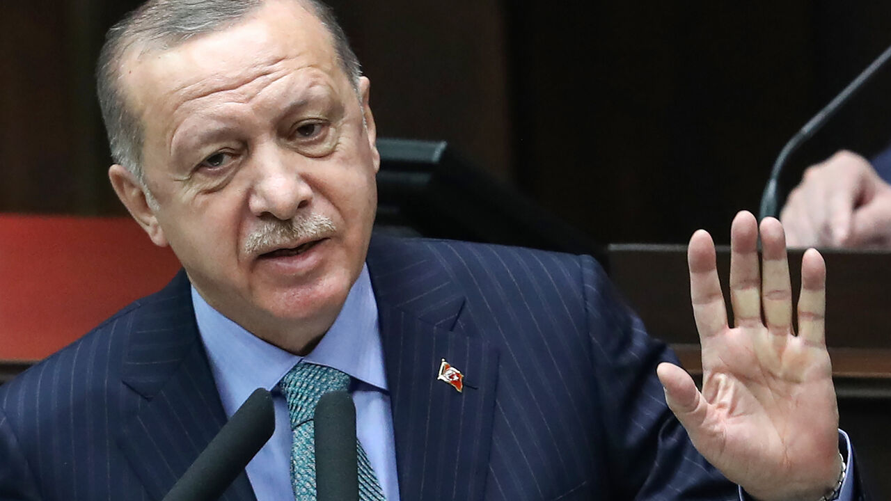 Turkish President and leader of the Justice and Development Party (AK Party) Recep Tayyip Erdogan delivers a speech during a meeting of members of the AK Party at the Turkish Grand National Assembly in Ankara, on February 24, 2021. (Photo by Adem ALTAN / AFP) (Photo by ADEM ALTAN/AFP via Getty Images)