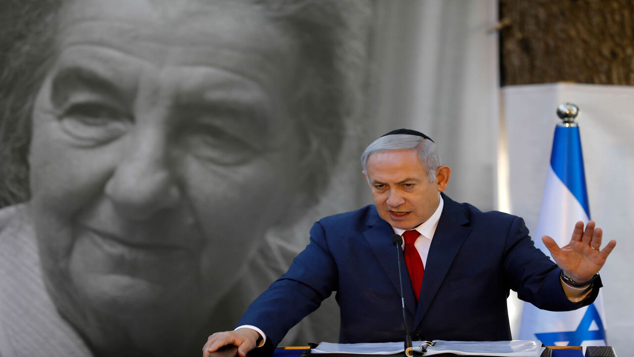Israeli Prime Minister Benjamin Netanyahu speaks during a state memorial ceremony for his late predecessor Golda Meir at Mount Herzl in Jerusalem on November 18, 2018. (Photo by Menahem KAHANA / AFP)        (Photo credit should read MENAHEM KAHANA/AFP via Getty Images)
