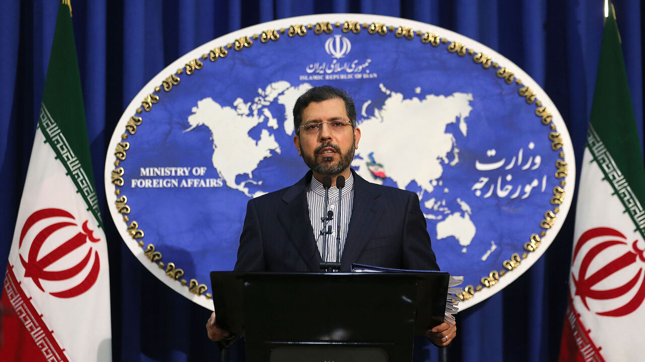 Iranian foreign ministry spokesman Saied Khatibzadeh gestures during a press conference in Tehran on February 22, 2021. - Iran hailed as a "significant achievement" a temporary agreement Tehran reached with the head of the UN nuclear watchdog on site inspections. That deal effectively bought time as the United States, European powers and Tehran try to salvage the 2015 nuclear agreement that has been on the brink of collapse since Donald Trump withdrew from it. (Photo by ATTA KENARE / AFP) (Photo by ATTA KEN